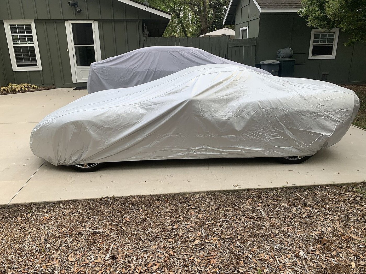 A customer's car under its CarCovers cover