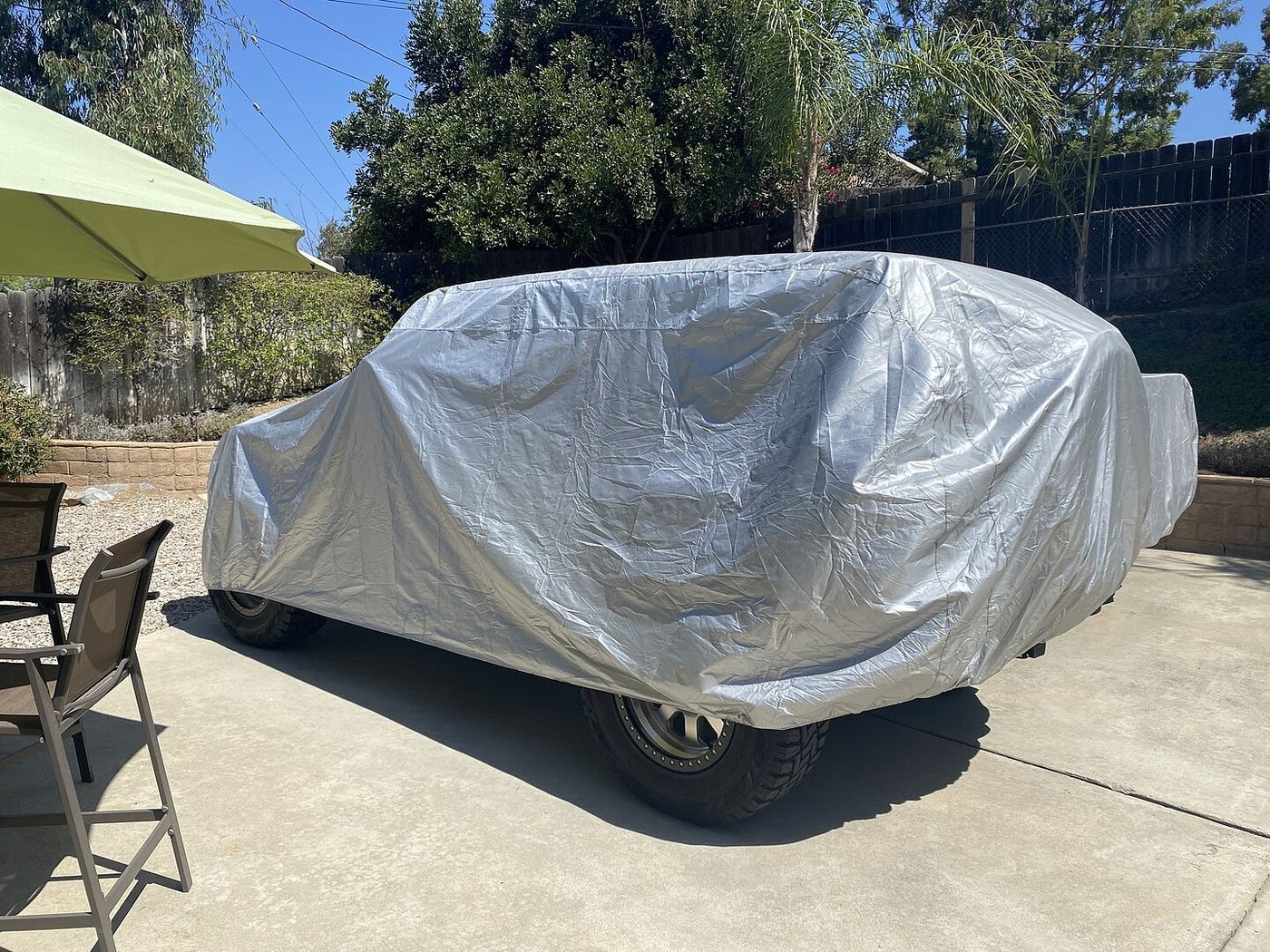 A customer's SUV under its CarCovers cover